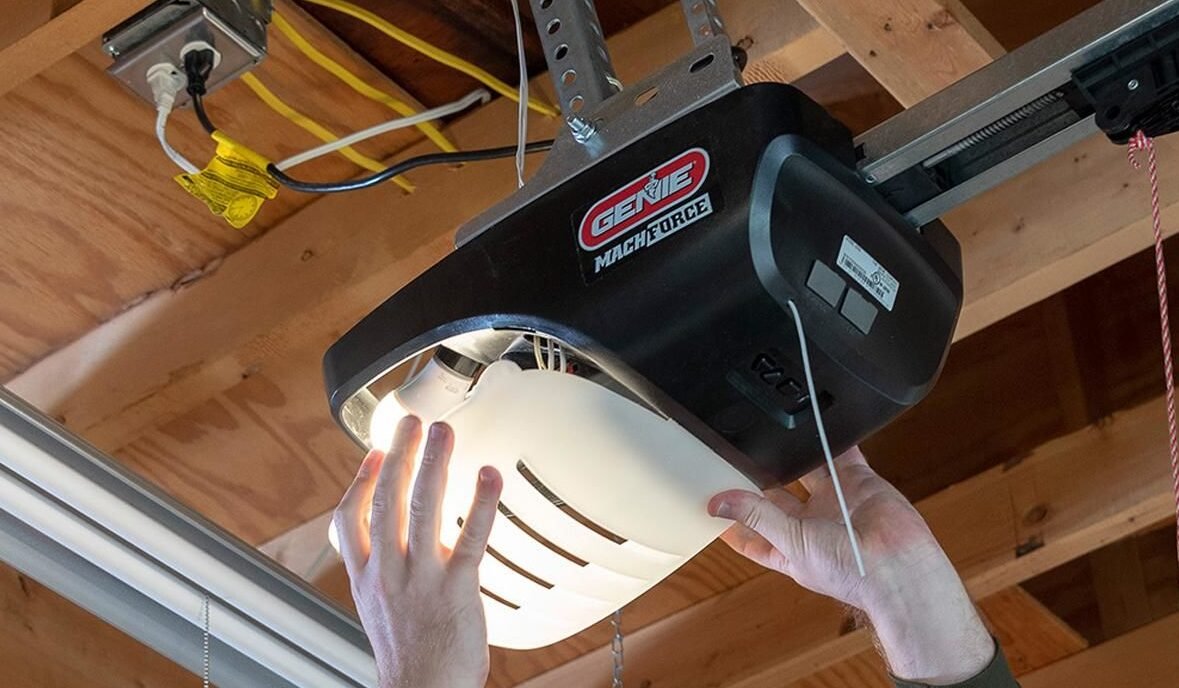 Technician performing garage door opener repair in Columbus, Ohio