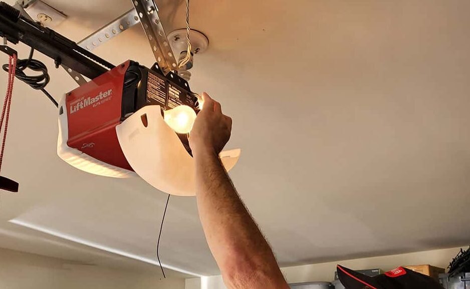 Technician performing garage door opener repair in Columbus, Ohio, showcasing professional service and quality workmanship.